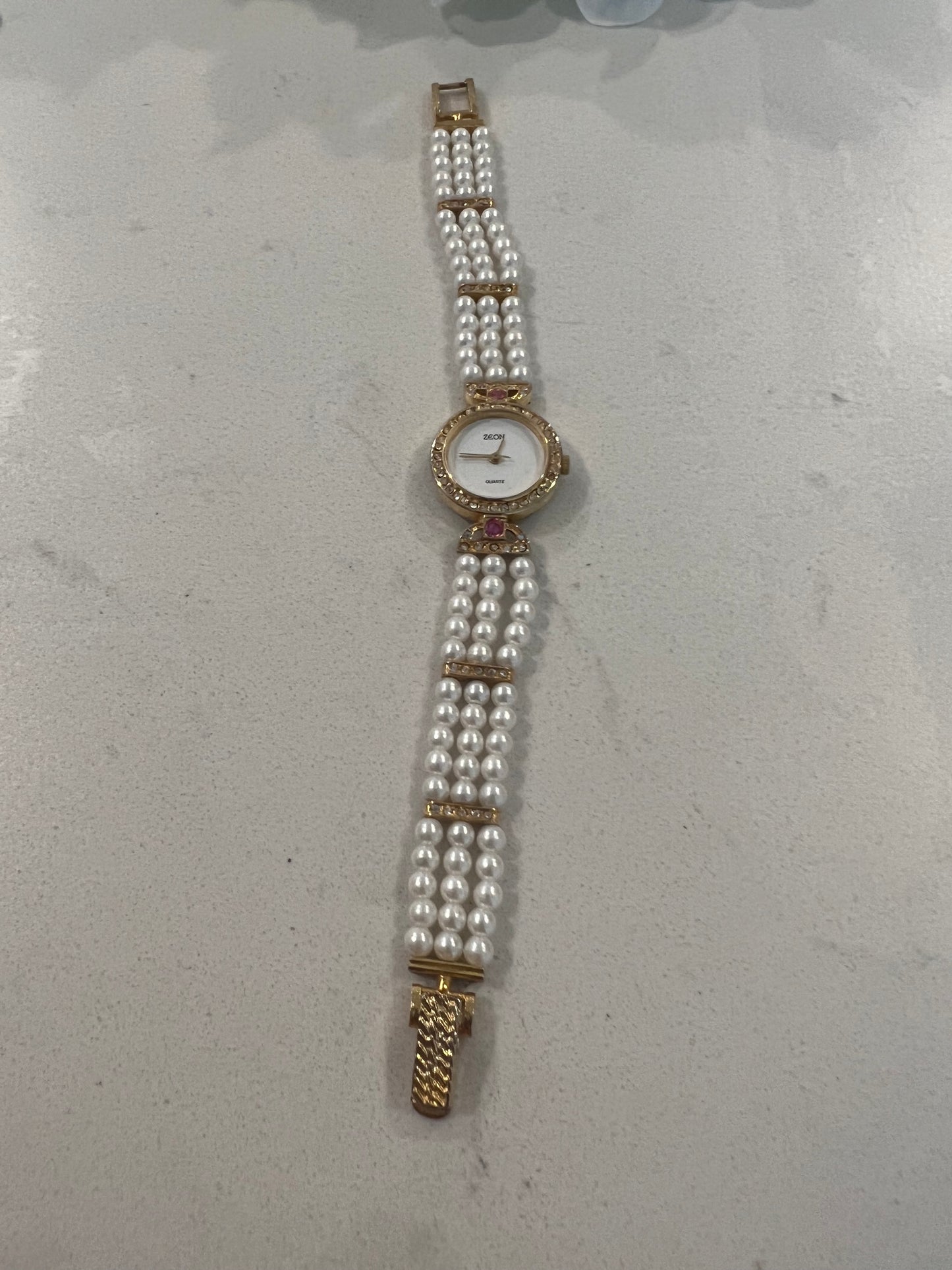 Zeon pearl watch